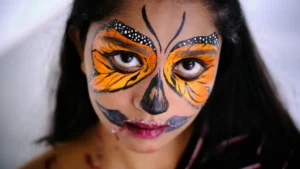 Viso ragazza trucco farfalla Halloween